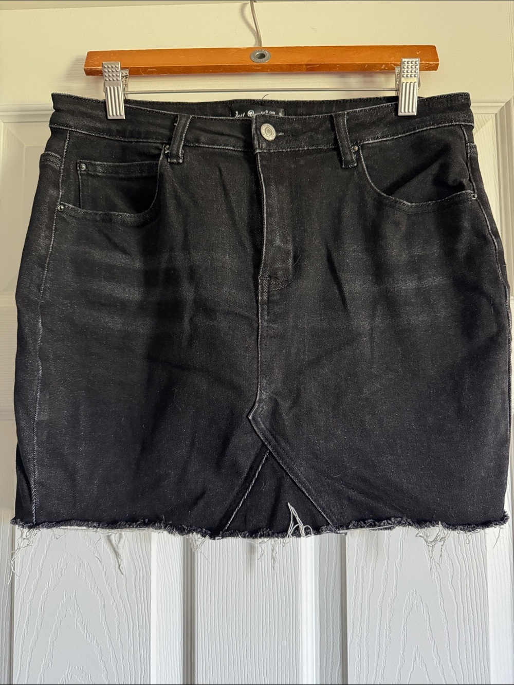 Washed Black Denim Mini Skirt with Frayed Hem